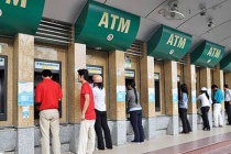 Phí dùng thẻ ATM: “Đạn đã lên nòng”